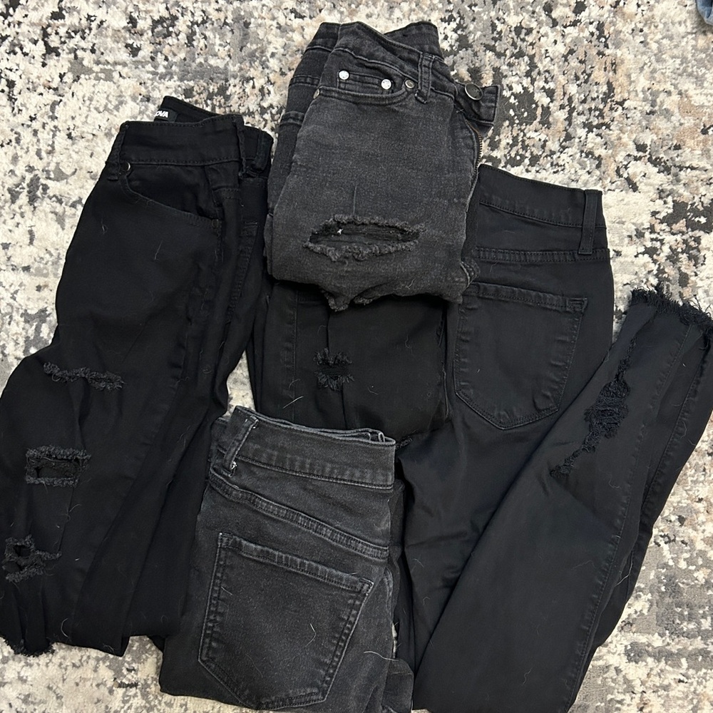 5 pairs of black jeans